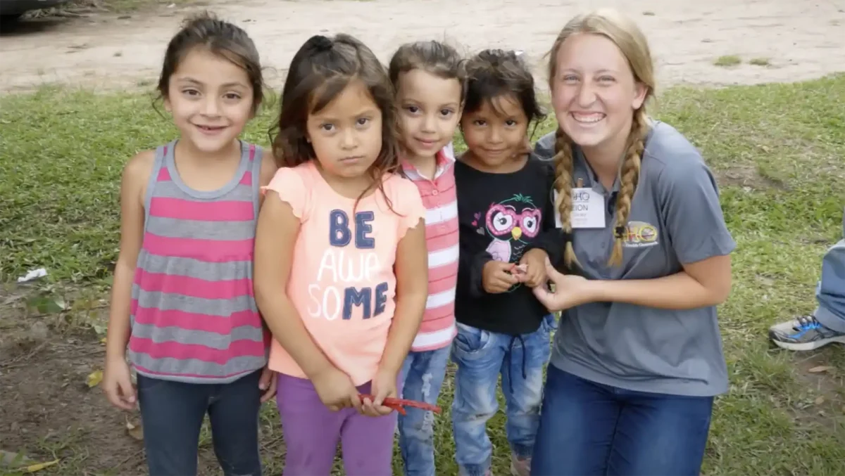 4 young children and mission team member