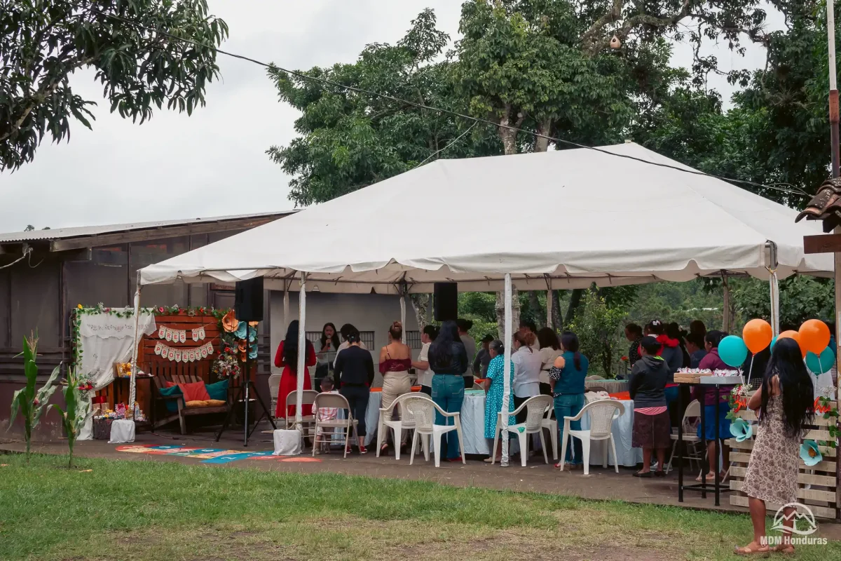 group of women watching a small play performed