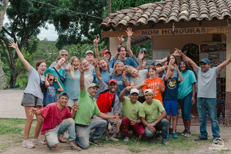 mission team posing and celebrating