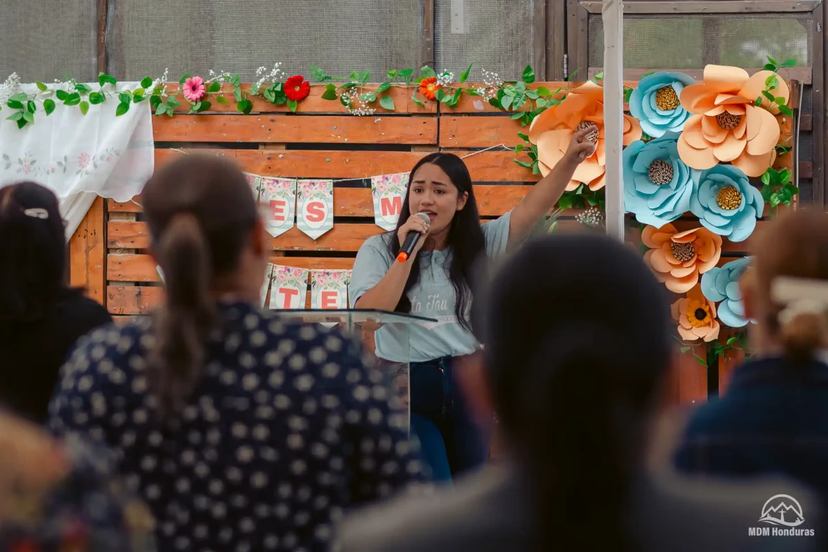 woman speaking to group of women