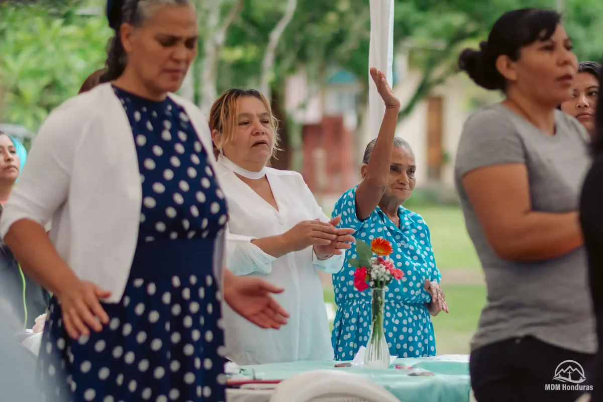 group of women worshipping