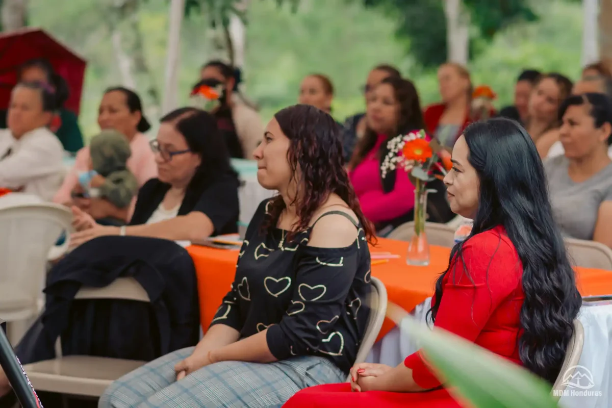 women listening to presentation