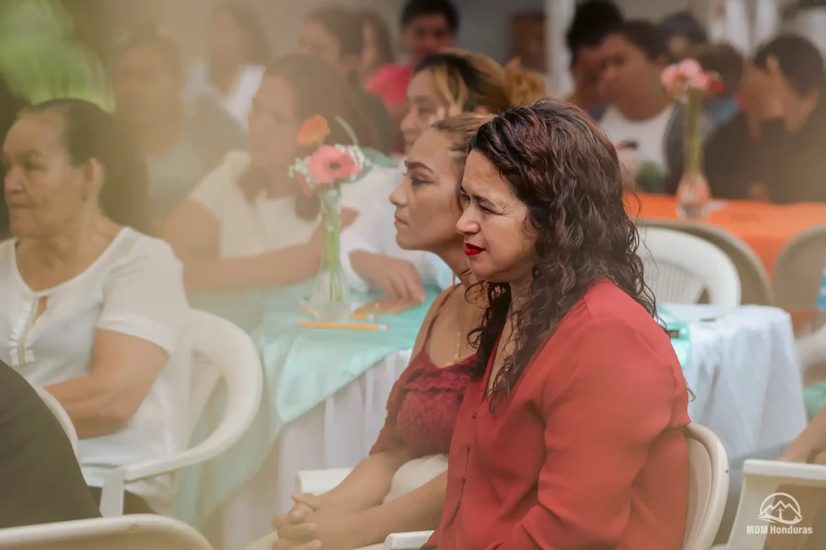 women in audience listening