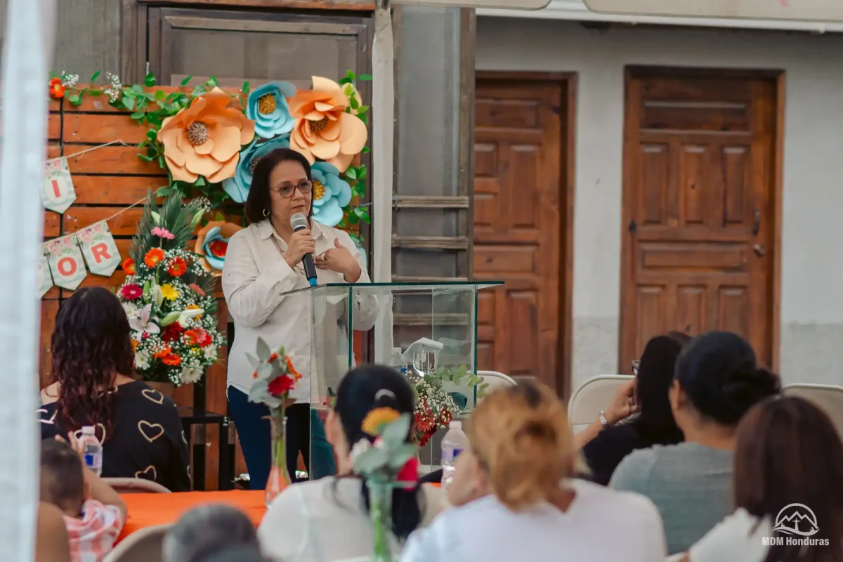 speaker and audience at women's conference