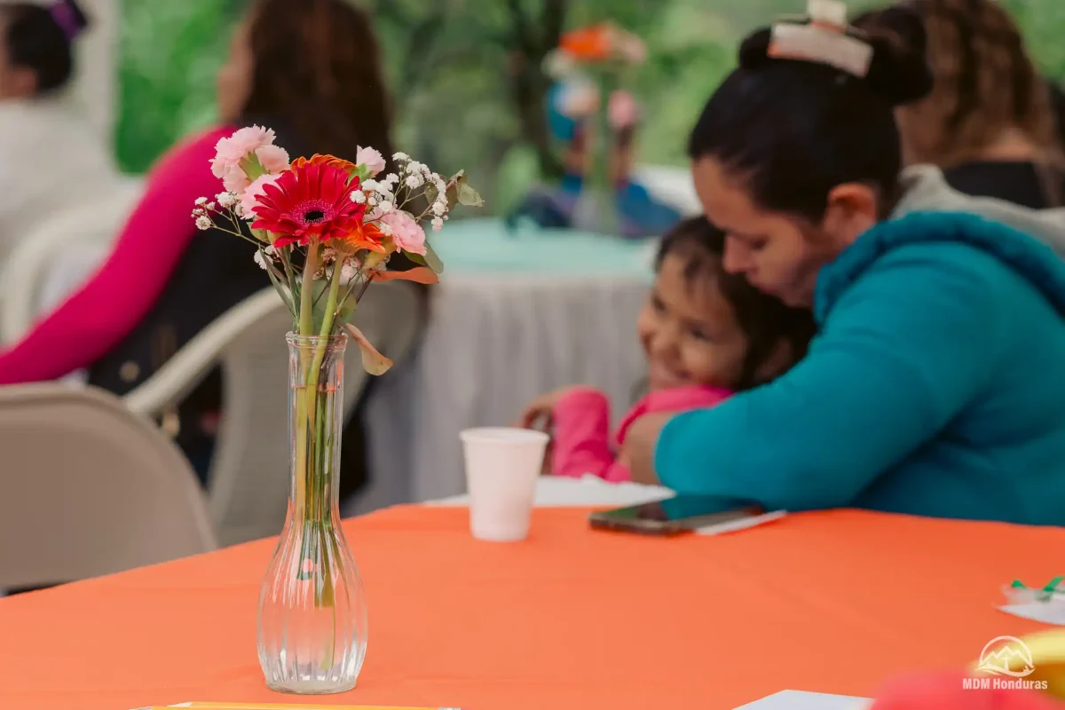 Closeup of flowers on table at conference