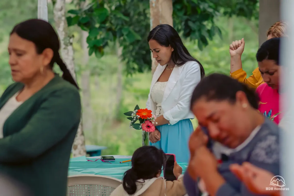 Group of women praying